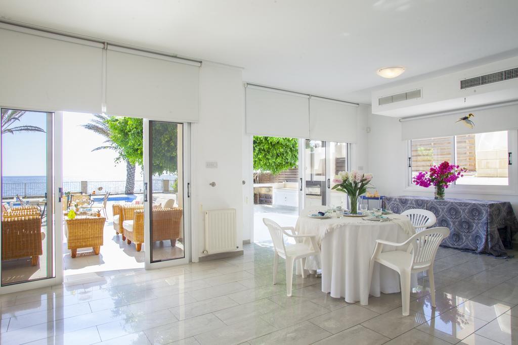 Meneou Beachfront Villa Sunset Perivolia Habitación foto