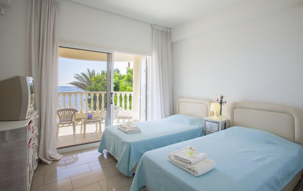 Meneou Beachfront Villa Sunset Perivolia Habitación foto